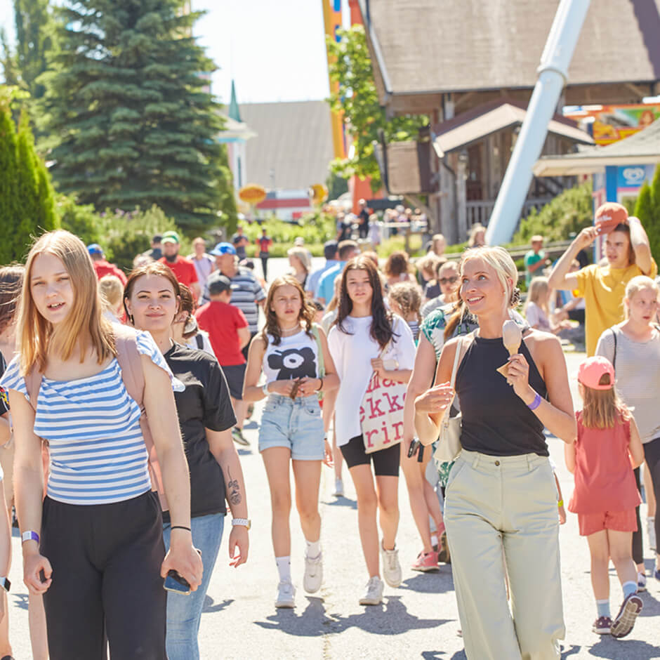 Visitors enjoying a busy day at PowerPark on a sunny summer day.