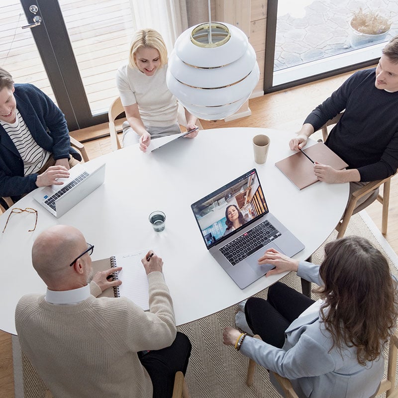 Solteq's sales professionals working with the customer at the conference table