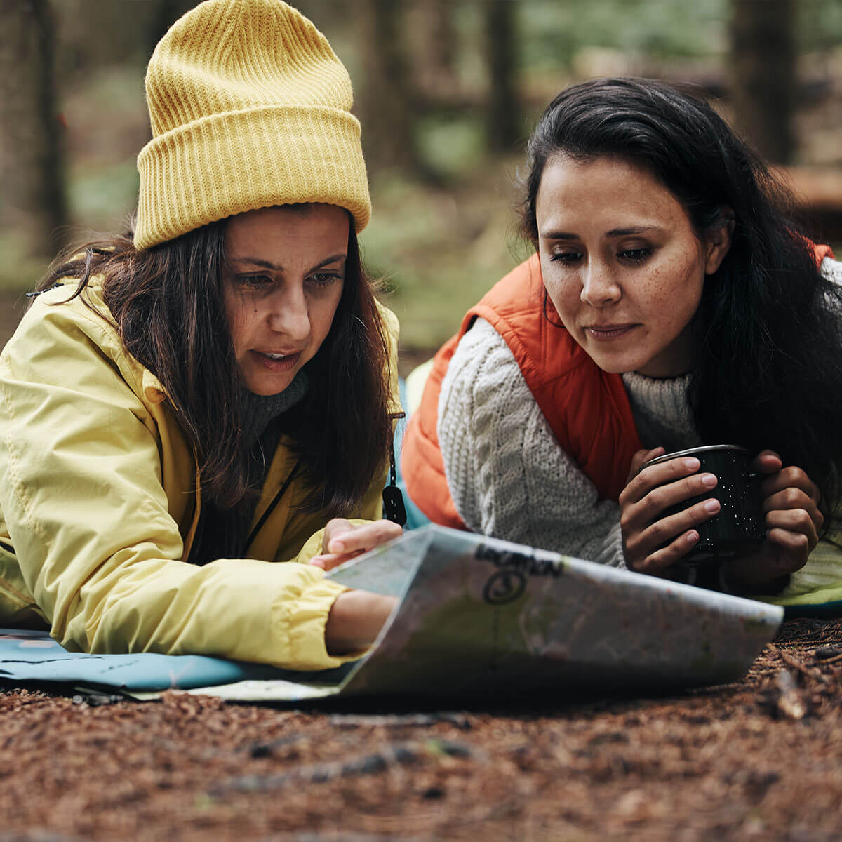 Two women looking at map