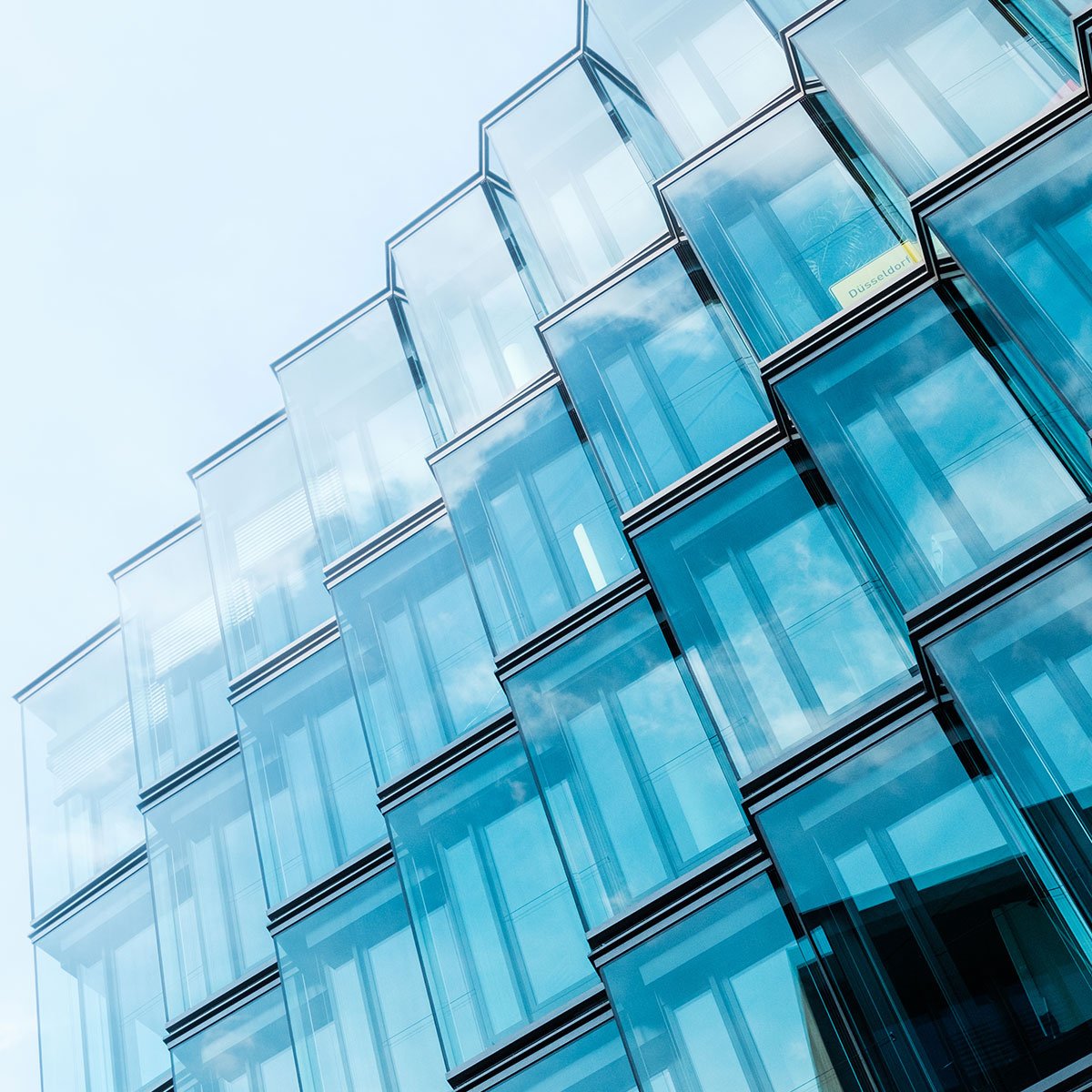 A modern glass facade that represents integrations