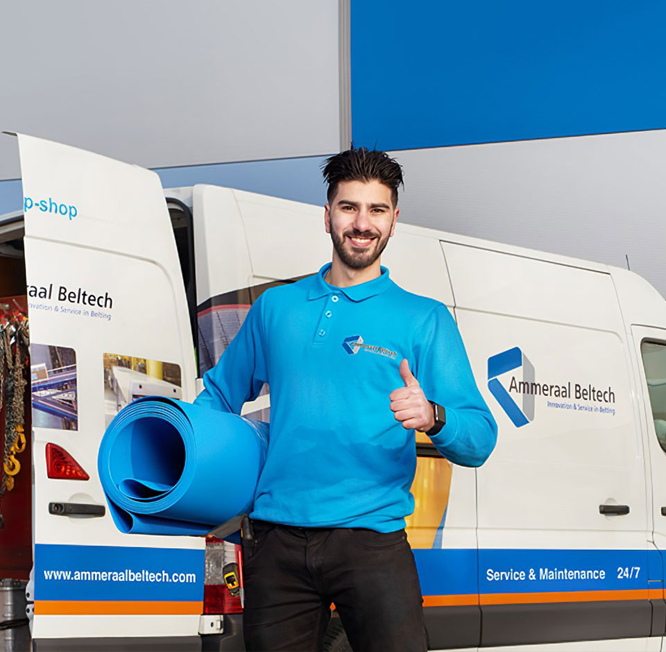 Ammeraal Beltech worker in front of maintenance vehicle