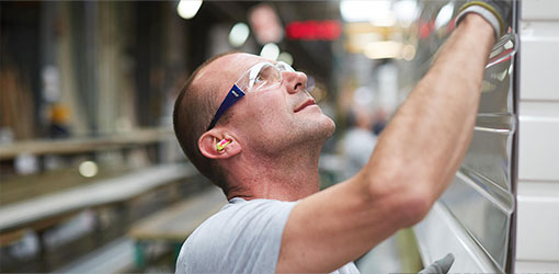 Man working in electrical wholesaler warehouse