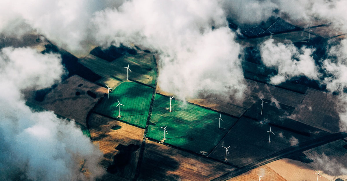 View to wind mills through the clouds.