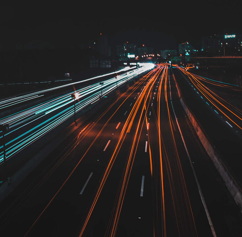 Trafi query - Car lights and traffic in night view of motor highway