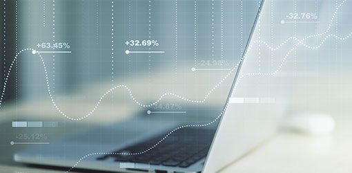 Energy consumption graphs and laptop.