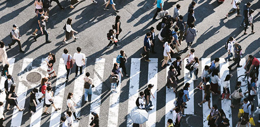People crossing pedestrian pathway