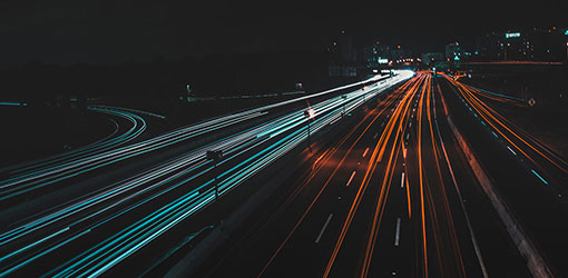 Trafi query - Car lights and traffic in night view of motor highway